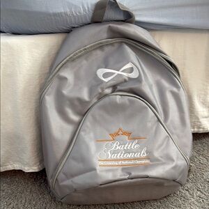 Battle Nationals Champion Backpack with Infinity and Crown logos.